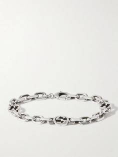 Gucci's bracelet has been made in Italy from silver that's treated to look like a vintage piece. It's detailed with a trio of archival 'GG' emblems worked into the chain. Channel Jewelry, Gucci Bracelet, Mens Designer Jewelry, Gucci Collection, Men Bracelet, Silver Chain Bracelet, Bracelet For Men, Gucci Accessories, Gucci Men