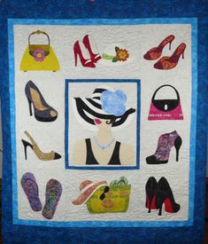 a quilted wall hanging with shoes and purses on it