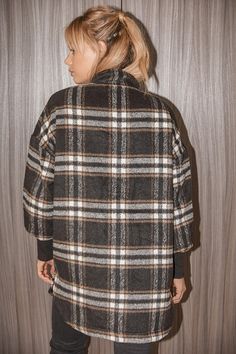 We can't wait for cold weather so we can rock the BB Dakota Plaid Times Black Multi Plaid Coat! Brushed plaid wool, in hues of cream and beige, shapes this cozy coat that has a collared neckline and long balloon sleeves with extra-long stretchy cuffs. The slightly oversized silhouette ends at a rounded, notched hem and is completed with a hidden zipper down the center and diagonal flap pockets. Snap button closures at the collar and hem. Fit: This garment fits true to size. Length: Mid-thigh. Si Plaid Wool Coat With Long Sleeves For Fall, Long Sleeve Plaid Wool Coat For Fall, Brown Turtleneck Outerwear For Winter, Oversized Shacket For Cold Weather In Fall, Brown Turtleneck Outerwear For Fall, Collared Wool Coat For Fall, Oversized Winter Shacket For Cold Weather, Oversized Turtleneck Outerwear For Fall, Oversized Turtleneck Outerwear For Cold Weather