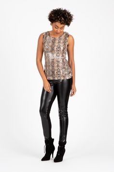 SPARKLING COBRA Tank- This tank is a hot Item to wear alone or pair it with our jacket!! It is made in a luxurious cobra pattern colored in neutrals, and covered with small and subtle clear sequins. The Body is slightly form fitting, but the stretchy knit fabrication allows the body to move with ease. Wear it casually with jeans, pair it up with the matching jaacket or dress it up with your favorite skirt or pants. Tank is fully lined. Neutral Colors, Knit Fabric, Leather Pants, Knitted Fabric, Sparkle, Tank Top, Tank Tops, Skirt, Knitting