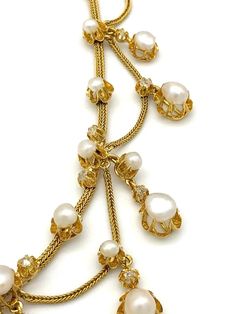 For Sale on 1stDibs - This elegant Belle Époque necklace is composed of collet set oriental pearls and rose cut diamonds connected by foxtail gold chains. The clasp is hallmarked Elegant Pearl Necklace With Chain For Wedding, Elegant Wedding Pearl Necklace With Chain, Elegant Pearl Necklace With Chain For Evening, Elegant Pearl Necklace With Chain For Formal Occasions, Formal Yellow Gold Pearl Necklace With Chain, Antique Formal Pearl Chain Necklace, Antique Pearl Chain Jewelry For Formal Occasions, Antique Pearl Chain Necklace For Formal Occasions, Victorian Pearl Necklace For Formal Occasions