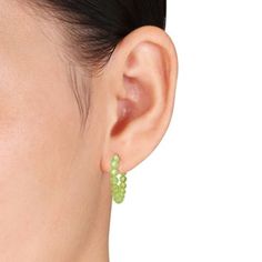 Embrace the refreshing elegance of our Peridot Beaded Faceted Hoop Earrings in Yellow Silver. These delightful hoop earrings feature faceted peridot beads totaling 5 carats, intricately arranged along the yellow silver hoops. The faceted design adds a touch of sparkle and sophistication to the vibrant green hue of the peridot, creating a captivating accessory. The hoop silhouette makes these earrings a versatile choice, suitable for both casual and formal occasions. Elevate your style with the v Hoop Jewelry With Faceted Beads, Gift Hoop Earrings With Faceted Beads, Small Hoop Earrings With Faceted Beads, Yellow Plates, Faceted Design, Beaded Hoop Earrings, Beaded Hoops, Vibrant Green, Silver Hoops