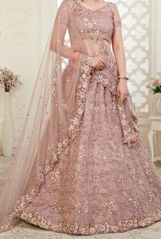 Latest Designer Bridal Wedding Wear Lehenga Choli. LEHENGA FABRIC: Net with Banglori Silk BLOUSE FABRIC: Net with Banglori Silk DUPATTA: Net COLOR: Dusty Pink WORK: Embroidery Bonus offer - Receive a free mystery gift with your order. Stitching Option - We will email you the measurement guide to confirm your size. SHIPPING: The product will be shipped within 1 - 2 weeks from the date of purchase. Product is returnable if un-Stitched This product qualifies for free shipping For any Rush/Urgent or Gold Lehenga, Lehenga Online, Lehenga Style, Net Lehenga, Pink Lehenga, Lehenga Choli Online, Lehenga Skirt, Designer Lehenga, Desi Girl