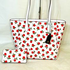 Nwt Kate Spade Dana Floral Tote With Matching Bifold Wallet Nwt Dana Tote: Color : Multi Materials: Saffiano Pvc Lining Two Way Script Logo Lining Measures: 15.75” W X 11.15” H X 5.7” D Strap Drop: 11.5” Top Zip Closure Interior Front Slip And Back Zip Pockets Nwt Dana Large Slim Bifold Wallet Color: Multi Measures: 6.73”W X 3.54” H X 1” D Materials: Saffiano Pvc Snap Closure 12 Credit Card Slots Id Window , 4 Slip Pockets Exterior: Zip Pocket On Back Check Out My Closet For Other Items Like Mic White Kate Spade Bags With Card Slots, Rectangular Kate Spade Shopping Bag, Red Kate Spade Wallets For Everyday Use, Kate Spade Strawberry Wallet, Leather Laptop Tote, Kate Spade Wallets With Zipper Closure, Kate Spade Wallet Pink, Kate Spade Pink Bag With Zipper Closure, Pink Christmas Gifts