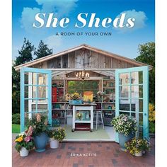 she sheds a room of your own with flowers and potted plants in the front