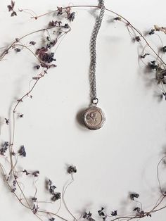 Silver Locket Necklace Vintage Style Jewelry Small Photo - Etsy Elegant Round Pendant Locket Necklace With Birth Flower, Elegant Round Locket Necklace With Birth Flower, Elegant Birth Flower Round Pendant Locket Necklace, Vintage Silver Necklaces With Birth Flower, Vintage Silver Necklace With Birth Flower, Vintage Silver Birth Flower Necklace, Elegant Medallion Locket Coin Necklace, Vintage Charm Coin Necklace With Round Pendant As Gift, Elegant Round Disc Locket Necklace