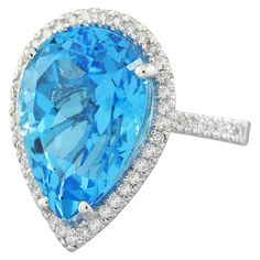 Stamped: 14K Total Ring Weight: 6.4 Grams Topaz Weight 16.00 Carat (18.00x13.00 Millimeters)Diamond Weight: 0.65 carat (F-G Color, VS2-SI1 Clarity )Face Measures: 22.75x16.55 Millimeter SKU: [600645] Fine Jewelry Pear-shaped Topaz Ring, Formal Teardrop Topaz Rings, Formal Teardrop Ring Gia Certified, Fine Jewelry Pear-shaped Topaz Ring With Brilliant Cut, Pear-shaped Brilliant Cut Topaz Ring In Fine Jewelry Style, Formal Pear-shaped Topaz Ring, Pear-shaped Topaz Ring For Formal Occasions, Formal Teardrop Blue Topaz Ring, Formal Pear-shaped Blue Topaz Ring