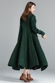 "Vintage inspired but modern wool maxi coat that will keep you warm and stylish this winter, Excellent high-quality winter outwear that don't cost a fortune. DETAIL * Excellent high-quality, medium weight, warm wool fabric * (50% wool, 50% fiber,nylon, etc. ) * Matching satiny lining. * Double breasted, Button closure * Calf length * Fit and flare Silhouette * Two side seam pockets * Fit for autumn-to-winter * A really beautiful coat if you love the vintage look. True craftsmanship. * The skirt Spring Wool Coat In Solid Color, Spring Wool Coat With Stand Collar, Fitted Long Wool Coat In Solid Color, Spring Long Wool Coat Solid Color, Spring Long Wool Coat In Solid Color, Chic Green Wool Coat For Winter, Green Long Sleeve Wool Coat For Spring, Green Sweater Coat With Pockets, Green Long Wool Winter Coat