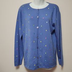 This Is New With Tags And Is A 7 Button Down Sweater In A Nice Blue Color And Colorful Dots That Are Like Polka-Dot Pattern. 55%Acrylic 45% Cotton Embroidery Dots 100% Polyester. A34595 Chest 40" Length 26 Blue Winter Tops With Snap Buttons, Blue Crew Neck Cardigan With Button Closure, Blue Cotton Cardigan With Buttons, Spring Blue Sweater With Button Closure, Blue Cotton Sweater With Button Closure, Blue Crew Neck Sweater With Button Closure, Blue Button-up Sweater With Buttons, Embroidery Dots, Easter Cardigan