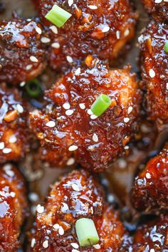 sesame seed meatballs with sauce and green onions