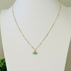 "Add a touch of whimsy to your look with our Melissa Dainty Bee Necklace. Featuring a delicate mini cubic zirconia bumble bee charm, this necklace comes in your choice of emerald or topaz crystals. Crafted with your style in mind, it's attached to a 14K gold filled satellite or rolo chain for a timeless and elegant look." Material: 14K gold filled Chain: 14K gold filled 18” Satellite or Rolo Pendant: Cubic Zirconia and 14K gold Filled Pendant Size: 13.8mm x 11.6mm x 4.6mm Tarnish-Resistant Hypoa May Birthstone Charm Necklace With Round Pendant, May Birthstone Pendant Necklace With Delicate Chain, Pendant Charm Necklace For Her May Birthstone, Delicate Green Charm Necklaces With Delicate Chain, May Birthstone Pendant Charm Necklace With Delicate Chain, May Birthstone Pendant Charm Necklace As Gift For Her, Dainty Emerald Pendant Necklace With Delicate Chain, Dainty Emerald Necklace With Round Pendant, Dainty Necklaces With Adjustable Chain For May Birthstone