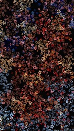 an image of many different colored flowers in the dark night sky with stars on it