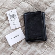 New With Tags Coach Men's Black, Leather Wallet. Coach Leather Trifold Wallet With Card Slots, Coach Leather Trifold Wallet For Everyday Use, Coach Black Trifold Wallet, Coach Black Rectangular Trifold Wallet, Coach Black Trifold Wallet For Everyday Use, Coach Black Trifold Wallet With Card Slots, Coach Leather Rectangular Trifold Wallet, Coach Leather Trifold Wallet For Business, Coach Black Leather Wallet