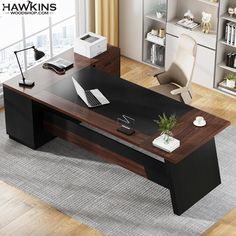 an office desk in the middle of a room