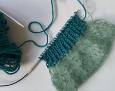 the yarn is being worked on by someone