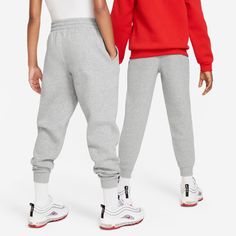 Prepared to tackle all their activities, soft enough for day-long wear, and designed with the style and quality synonymous with the Nike brand—parents and kids alike are guaranteed comfort with Nike's Club Fleece joggers for youth. Angled pockets. Ribbed cuffs. Embroidered Futura logo. Machine wash. Nike Leisure Sweats With Ribbed Cuffs, Nike Joggers With Ribbed Waistband For Streetwear, Nike Joggers With Ribbed Waistband For Jogging, Nike Sweats With Ribbed Cuffs For Leisure, Gray Sports Sweats, Nike Casual Joggers For Leisure, Casual Nike Joggers For Leisure, Sporty Nike Joggers For Leisure, Nike Sporty Joggers For Leisure