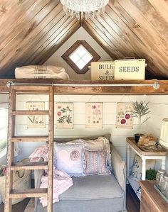 a loft bed with a couch underneath it and a ladder up to the top bunk