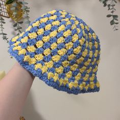 Crochet Bucket Hat Yellow And Blue Hand Made 100% Cotton Blue Yarn Bucket Hat For Spring, Blue Crochet Bucket Hat For Spring, Blue One-size Spring Crochet Hat, Yellow Crochet Hat For Spring, Yellow Adjustable Crochet Hat For Spring, Spring Adjustable Yellow Crochet Hat, Adjustable Yellow Crochet Hat For Spring, Handmade Yellow Bucket Hat For Spring, Blue Bucket Hat For Vacation