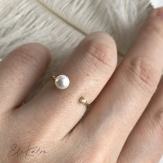 One piece of unique natural diamond and Akoya pearl open ring, a modern Toi Et Moi engagement ring * Metal: 18K solid gold * Stone: 4-4.5mm genuine Akoya pearl and earth mined diamond, G-H color/SI clarity * Carat: 0.02ctw * Stamp: 18K * Guaranteed Authentic Solid Gold, Not Plated or Filled ❤️Follow us on Instagram @ elekalonjewelry for latest projects and designs. *If you have any questions, please feel free to message us. Modern Wedding Pearl Ring, Modern Pearl Open Ring For Anniversary, Modern Open Pearl Ring For Anniversary, Minimalist Open Pearl Ring With Diamonds, White Pearl And Diamond Open Ring, Fine Jewelry Pearl Open Ring, Minimalist Diamond Pearl Ring As Gift, Minimalist Open Pearl Ring For Gift, White Pearl Open Ring Fine Jewelry