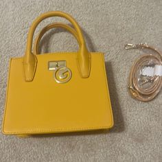 Mustard Yellow Bag, Brand New With Handled And Long Strap That Is Removable. Trendy Square Satchel With Branded Hardware, Gold Satchel With Branded Hardware For Shopping, Trendy Box Bag With Branded Hardware, Trendy Everyday Box Bag With Branded Hardware, Chic Gold Box Bag With Branded Hardware, Trendy Gold Satchel For On-the-go, Trendy Satchel With Branded Hardware For Shopping, Trendy Satchel With Double Handle And Branded Hardware, Trendy Gold Shoulder Bag With Branded Hardware