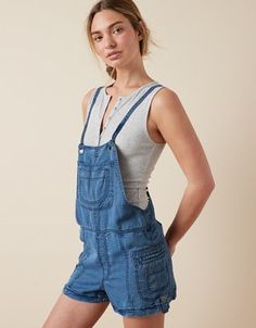 Flaunt some effortless warm weather style in this casual-cool baggy overall short, featuring vintage-inspired seam details. Baggy Overall Shorts, New Wardrobe, Baggy Fits, Overall Shorts, Kangaroo Pocket, Warm Weather, Woven Fabric, Kangaroo, Women's Jeans