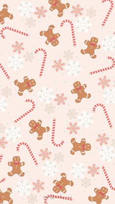 a pink background with gingerbreads and candy canes