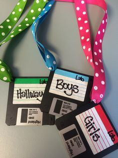 two floppy disk shaped lanyards with polka dots on them, one for boys and the other for girls