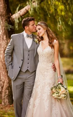 a bride and groom posing for a photo