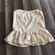 This Strapless Crop Top Is In New Condition, Never Worn. The Back Is Sheer Lace. Spring Lace Sleeveless Tube Top, Lace Tube Top For Spring, Chic Lace Tube Top For Summer, Spring Lace Tube Top, Chic Lace Summer Tube Top, Chic Lace Tube Top For Spring, Peplum Crop Top, Strapless Crop Top, Sheer Lace