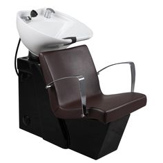 a brown and white hair salon chair