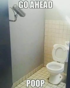 a white toilet sitting inside of a bathroom next to a shower stall with the caption go ahead poop