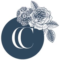 the letter c is surrounded by flowers and leaves