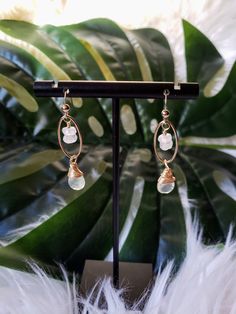 These gold and gemstone dangle earrings are elegant, lightweight and so feminine! Perfect for glamming up a look for a night out or special occasion. Details: Earrings are 1.75" long from tip of ear wires to bottom of dangles. Composed of 14kt. Gold Fill components, Moonstone Briolettes and Moonstone Rondelles. Ear wires are 14kt gold filled. Female handmade and designed in the USA. Dainty Metal Drop Pearl Earrings, Feminine Metal Drop Earrings, Wire Wrapped Metal Earrings For Party, Rose Gold Wire Wrapped Jewelry For Party, Chic 14k Gold-filled Drop Earrings, Feminine Dangle Jewelry For Party, Elegant Rose Gold Dangle Linear Earrings, Party Wire Wrapped Metal Earrings, Chic Pearl Drop Dangle Earrings