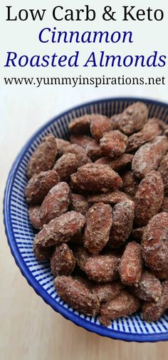 low carb and keto cinnamon roasted almonds in a blue bowl on a wooden table