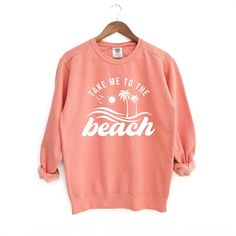 Looking for a cute versatile top to wear? Make sure to grab one of our Graphic Sweatshirts! This soft and comfortable shirt is the perfect top for any outfit. It can be paired with biker shorts, Jeans, or the classic stay at home sweats! This sweatshirt is true-to-size, so be sure to order your regular size! If you are looking for a more oversized look, make sure to size up. Spring Beach Cotton Sweatshirt, Trendy Cotton Sweatshirt For Beach, Cotton Sweatshirt With Letter Print, Summer Beach Cotton Sweatshirt, Cotton Summer Beach Sweatshirt, Cotton Summer Sweatshirt For Beach, Cotton Sweatshirt For Beach Vacation, Cotton Sweatshirt For Beach Season Vacation, Casual Sweatshirt For Beach Season