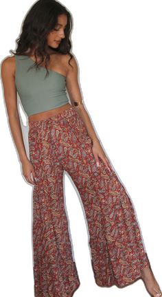 Trendy Summer Stretch Harem Pants, Casual Wide Leg Pants For Spring Festival, Trendy Stretch Harem Pants For Summer, Bohemian Flare Pants For Summer, Bohemian Flare Bottoms For Spring, Spring Bohemian Flare Bottoms, Summer Bohemian Flare Pants, Casual Flowy Harem Pants For Spring, Summer Rayon Harem Pants