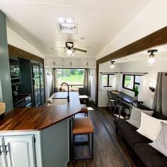 a kitchen and living room in an rv