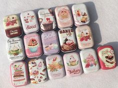 there are many tins that have different types of cakes and cupcakes on them