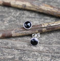 Black onyx sterling silver stud earrings 6mm black onyx stones are set in pure silver finished with sterling silver posts and ear nuts. Black Stone Earrings, Lavender Stone, Black Studs, Earrings Dangle Simple, Unisex Earrings, Black Stud, Creative Stuff, Black Onyx Stone, Sterling Silver Stud Earrings