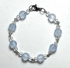 A pretty light blue silver bracelet with clear accent beads. Perfect for any occasion! Silver Beaded Bracelet, Silver Bead Bracelet, Pretty Lights, Jacksonville Fl, Silver Beads, Blue And Silver, Beaded Bracelet, Halloween Shopping, Silver Bracelet