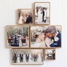 a couple kissing in front of their wedding pictures on the wall next to each other