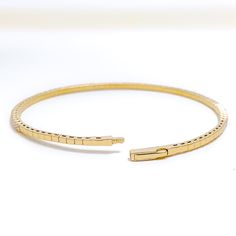 This exquisite 18k gold bangle bracelet, weighing 7.4 grams, features a classic design adorned with 1.56 carats of round brilliant cut diamonds. The diamonds have a color grade of F-G and a quality grade of VS, adding exceptional sparkle and elegance. The yellow gold finish enhances its luxurious appeal, making it perfect for any special occasion. The bangle has a diameter of 2.5 inches and an oval opening shape, offering both style and comfort. This piece is openable, designed with a push lock Modern Diamond Tennis Bracelet Bangle, Luxury Diamond Bangle Bracelet With Prong Setting, Modern Single Cut Diamond Bangle Tennis Bracelet, Yellow Gold Cubic Zirconia Cuff Bracelet, Classic Diamond Bangle With Flexibility, Classic Diamond Bangle With Flexible Design, Classic Flexible Diamond Bangle, Timeless Flexible Diamond Bangle Bracelet, Luxury Flexible Diamond Bangle