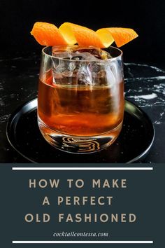 an old fashioned drink with orange slices on top and the words how to make a perfect old