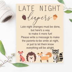 a card with the words late night diapers written on it next to some leaves