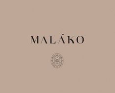 the word malko written in black ink on a beige background with an image of a circle