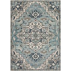 a blue and white rug with an ornate design on the bottom, in different colors