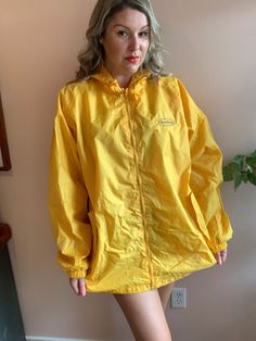 Great vintage yellow Nova Scotia raincoat. Hooded.  Brand: Viking - Brave the elements Size: 2XL - measurements from flat as per photos.  Jacket is in good vintage condition. There is one blue spot on the upper sleeve of one of the arms. This is reflected in the price. Still too cool to pass up.  * Please note that vintage items have been preowned and potentially preloved and are rarely 'Perfect.' I do my absolute best to source out amazing pieces that are in very good condition and thoroughly s Hooded Yellow Raincoat For Fall, Yellow Hooded Raincoat For Fall, Yellow Long Sleeve Outerwear For Rainy Season, Casual Yellow Raincoat For Fall, Yellow Hooded Rainy Season Outerwear, Casual Long Sleeve Yellow Raincoat, Casual Yellow Long Sleeve Raincoat, Yellow Waterproof Windbreaker For Fall, Casual Yellow Raincoat With Pockets