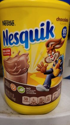 a close up of a container of nestle's resquik chocolate pudding