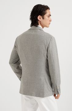 The combination of different natural fibers reinterprets the tailored feel of the Prince of Wales fabric with a particular retro effect: the cashmere provides warmth and lightness, the wool offers compactness, and the silk adds a smooth, fluid touch. An ultra-lightweight cupro lining provides added comfort. 3-roll-2 closure with horn buttons Notched lapel Patch pockets, ticket pocket and chest pocket Cuffs have four horn buttons and functional buttonholes Double back vent Cupro half lining Two i Formal Wool Tweed Jacket With Patch Pockets, Timeless Wool Blazer With Patch Pockets, Timeless Wool Sport Coat With Pockets, Luxury Wool Tweed Jacket With Patch Pockets, Luxury Wool Sport Coat With Pockets, Luxury Wool Sport Coat With Welt Pockets, Elegant Beige Sport Coat With Patch Pockets, Elegant Wool Outerwear With Patch Pockets, Classic Wool Tweed Jacket With Patch Pockets