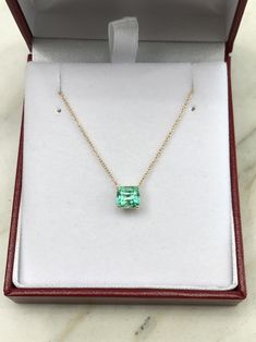 Featured here is a 1.32-carat stunning, Colombian emerald necklace in fine 14K yellow gold. Displayed in the center is a medium-light green emerald with incredible crystal clarity, accented by a simple four-prong gold mount, allowing for the emerald to be shown in full view. The earth mined, green Colombian emerald has a desirable lush green color with excellent qualities. An 18 inch is attached to the emerald pendant. This necklace is ideal for everyday use and is the perfect accessory to any o Luxury 14k Gold Emerald Necklace For May Birthstone, 14k Gold Emerald Cut Fine Jewelry Necklace, Exquisite Green Necklace With Brilliant Cut, Exquisite Emerald Necklace For Formal Occasions - May Birthstone, Exquisite Emerald Necklace For Formal Occasions And May Birthstone, Exquisite Formal Emerald Necklace For May Birthstone, Exquisite Brilliant Cut Emerald Necklace Gift, Exquisite May Birthstone Necklaces For Formal Occasions, Exquisite May Birthstone Necklace For Formal Occasions